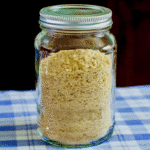 How to make dried bread crumbs, photo of crumbs in a mason jar square cropped for Google featured image.