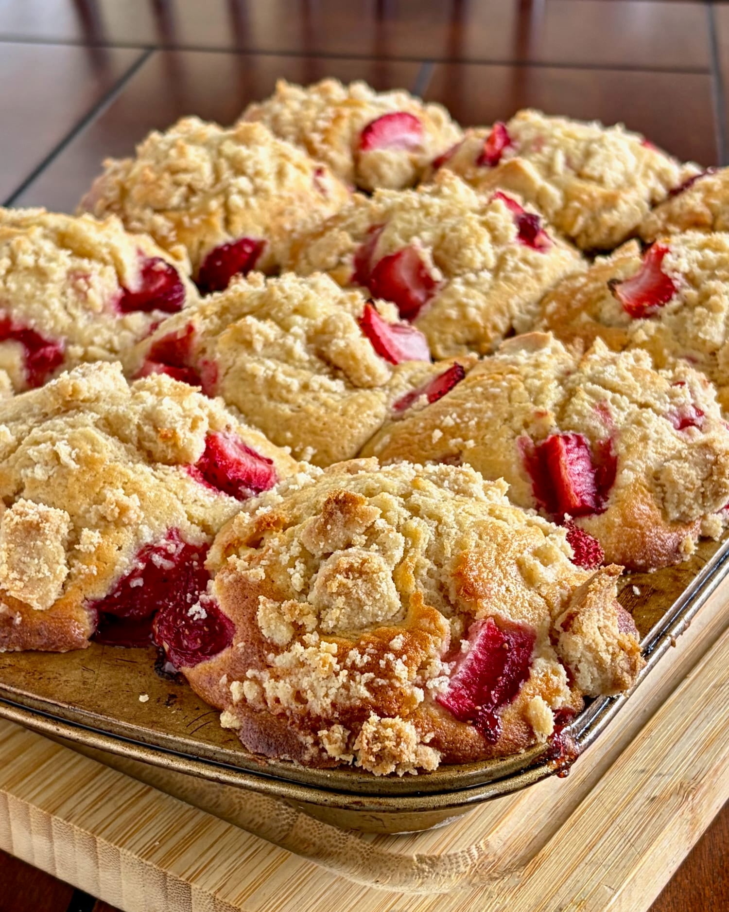 Strawberry Muffins with Shortbread Crumble fresh from the oven, still in baking pan.