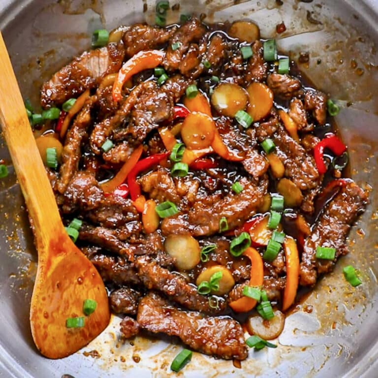 Mongolian Beef close up photo in a wok