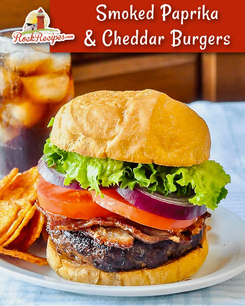 Smoked Paprika and Cheddar Burgers photo of one burger with title text added for social media posts.