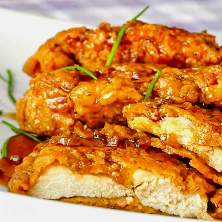 Double Crunch Honey Garlic Chicken Breasts close up photo of cut chicken for featured image.