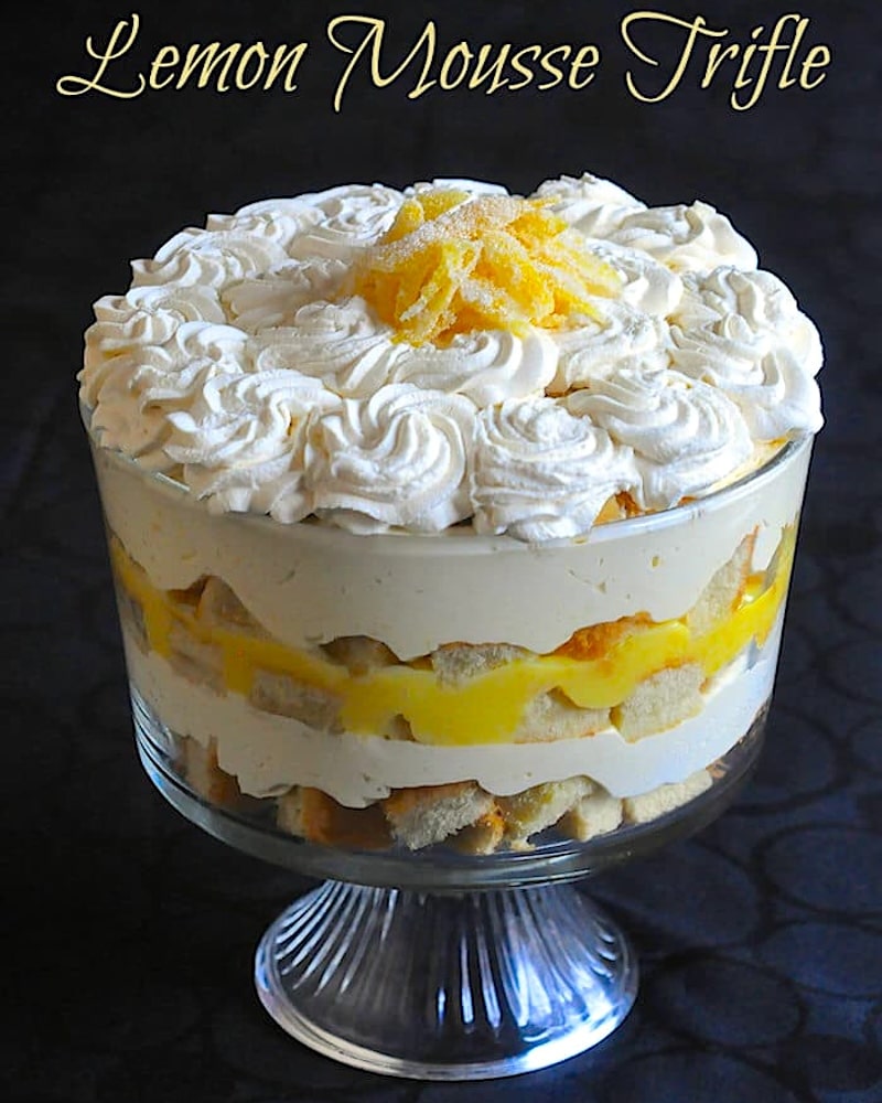 Lemon Mousse Trifle in a glass dish with title text added for Pinterest