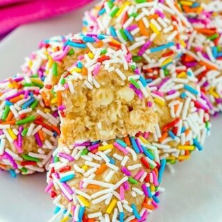 Unicorn Farts photo on white serving platter showing one cookie cut down centre