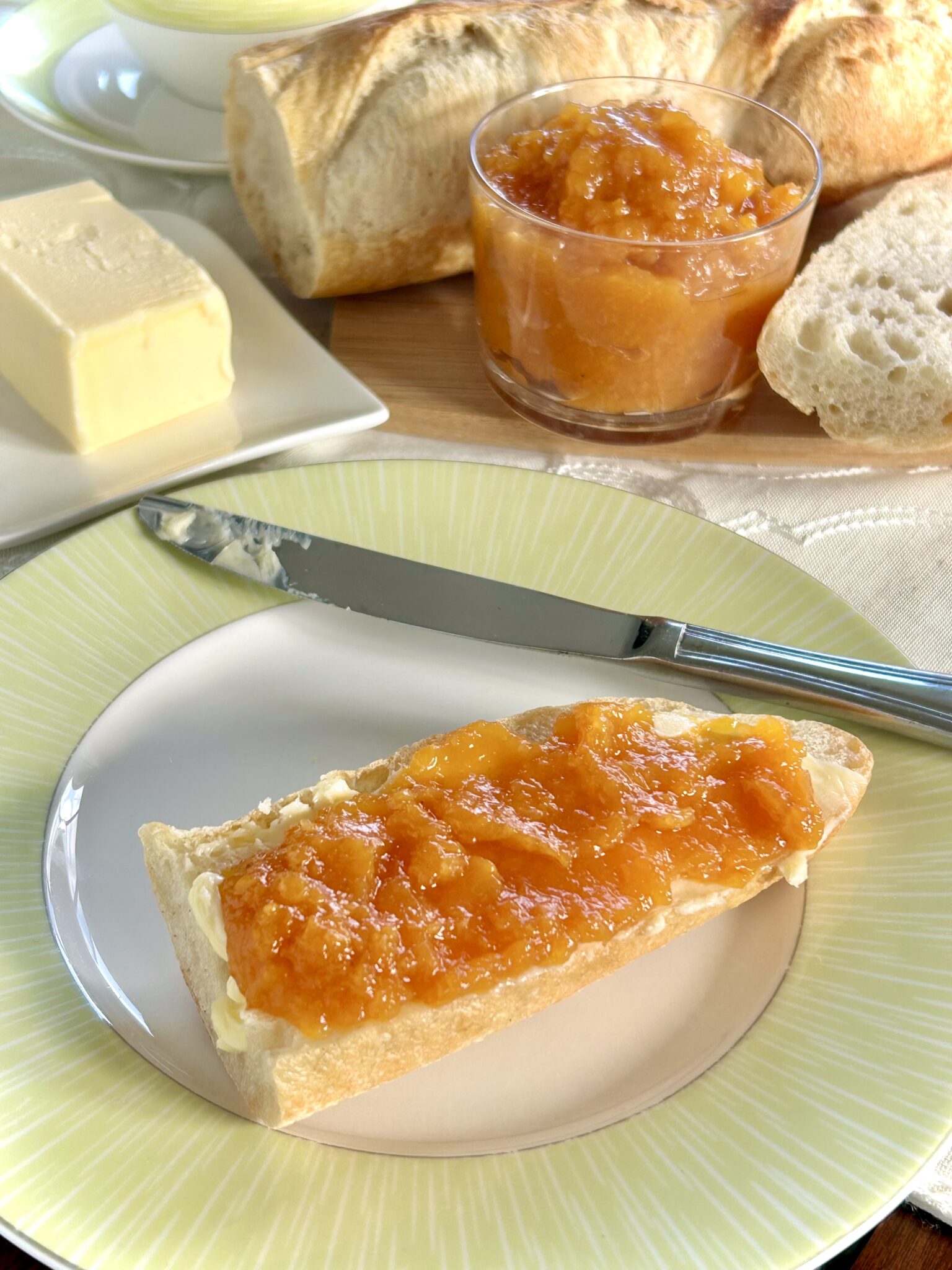photo showing fakeapple jam on baguette from overhead