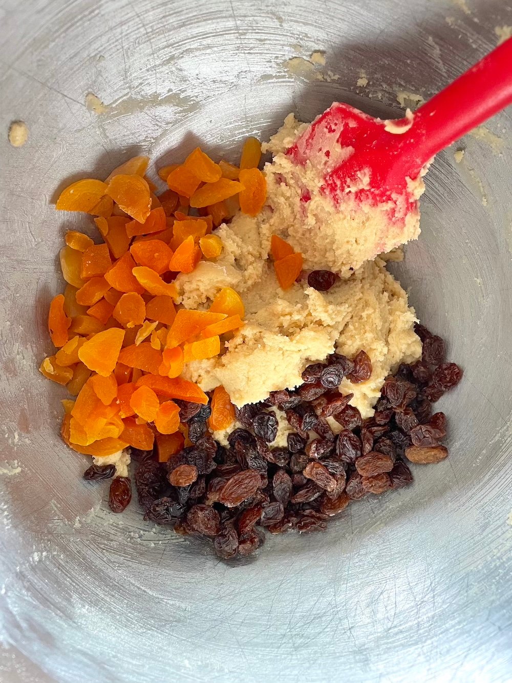 Adding ingredients to the bowl.