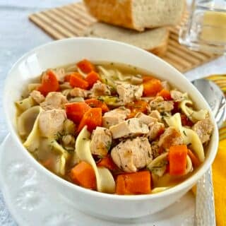 Close up photo of one bowl of Chicken Noodle Soup