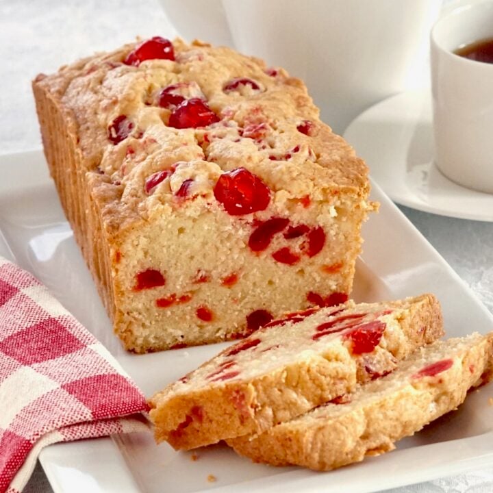 Newfoundland Cherry Cake photo of a sliced loaf cake on a white platter