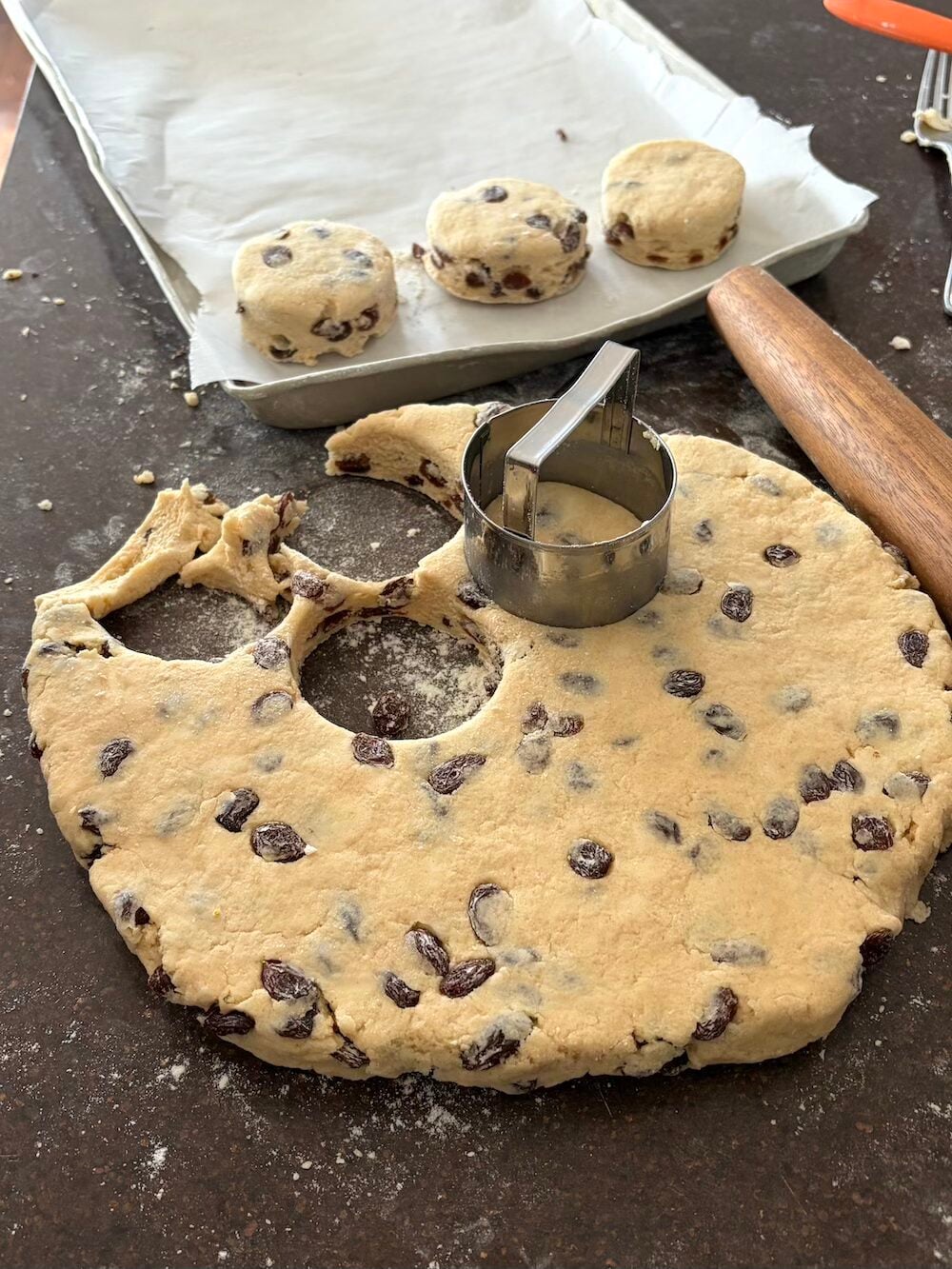 Buns being cut out of the dough.
