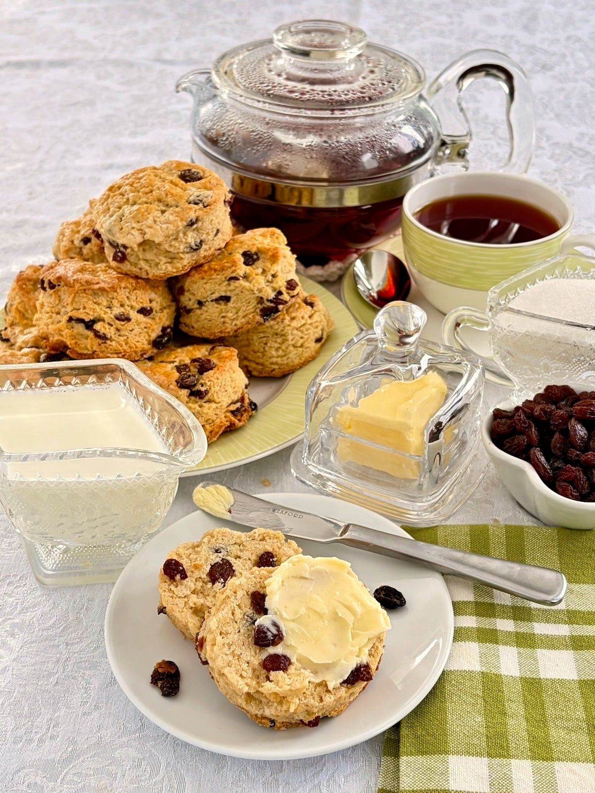Newfoundland Raisin Buns.overhead shot with creamer, sugar bowl and other items for tee service.