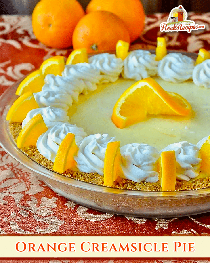 Orange Creamsicle Pie photo of whole pie with title text for social media posts.