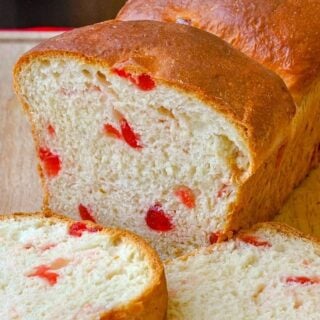 Cherry Bread close up photo of cut loaf.