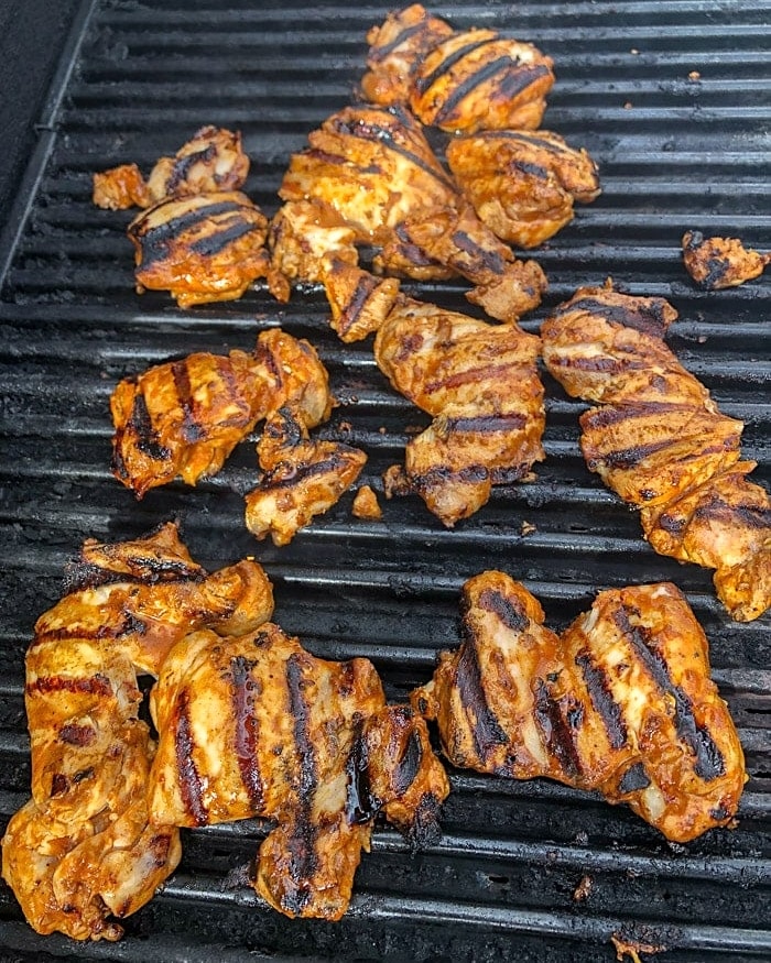 Grilling chicken for Chicken Souvlaki.
