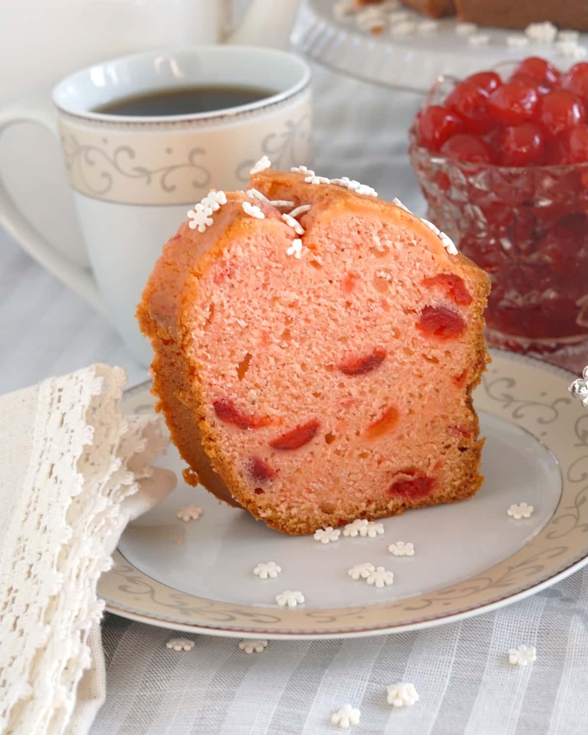 Maraschino Cherry Almond Pound Cake photo cropped image of one slice for social media