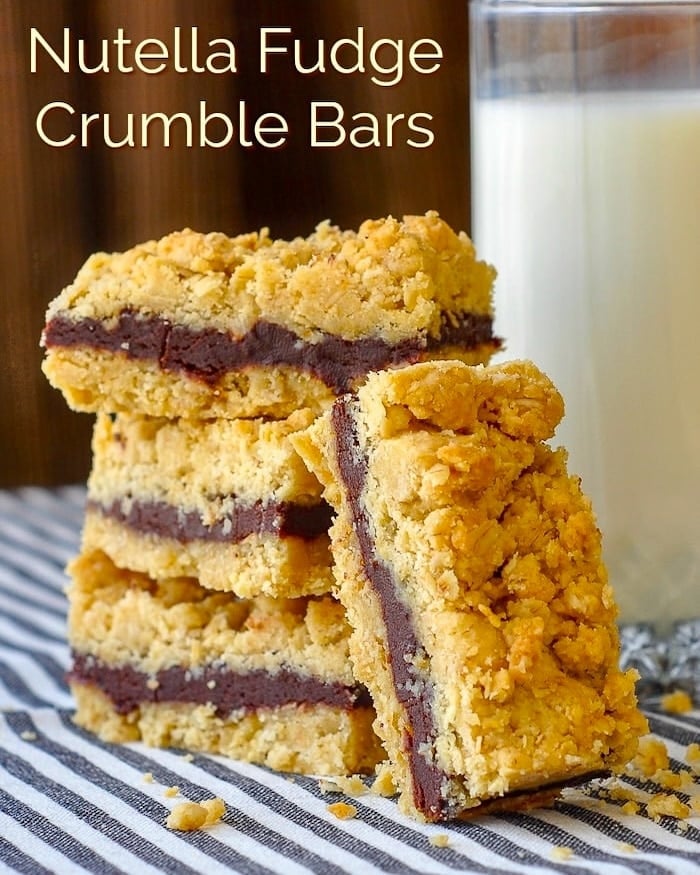 Nutella Fudge Crumble Bars shown stacked with a glass of milk with title text added for social media.