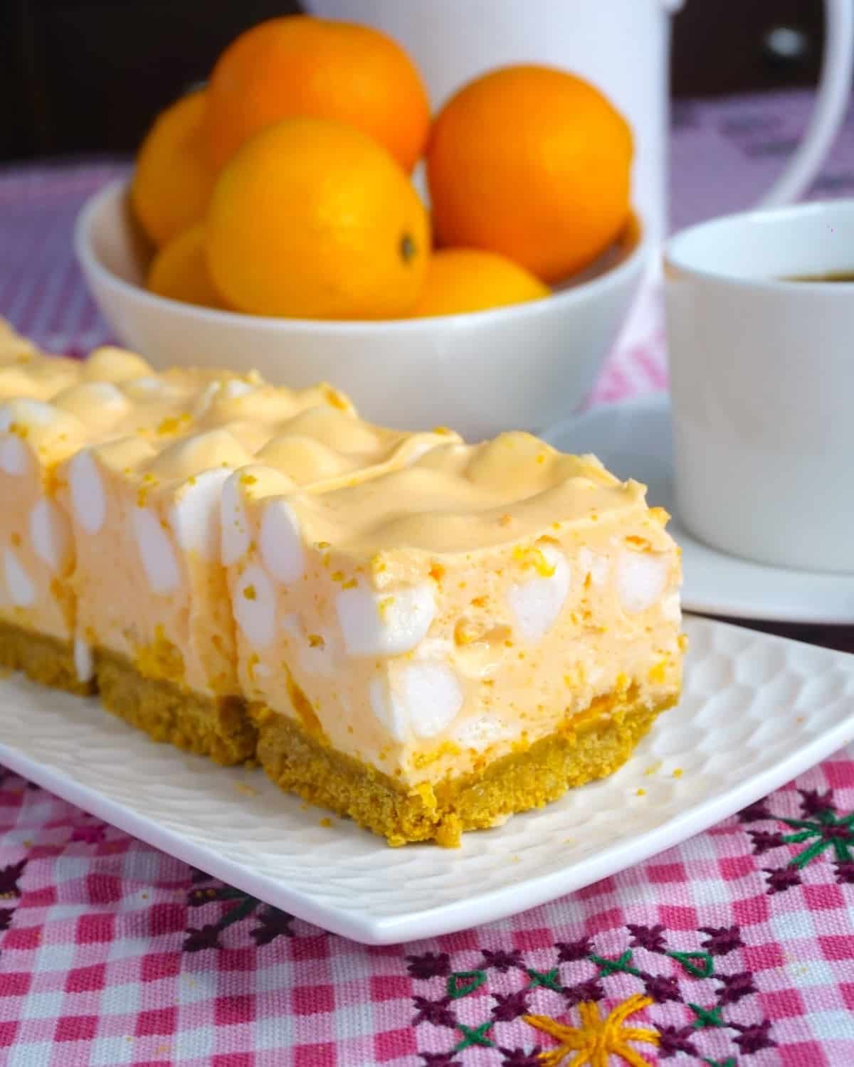 Orange Creamsicle Chiffon Squares on a white pebbled plate.