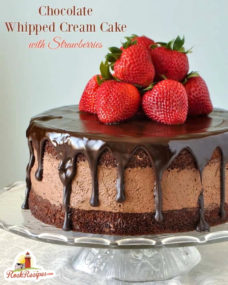 Chocolate Whipped Cream Cake with Strawberries photo with title text added for social media posts.
