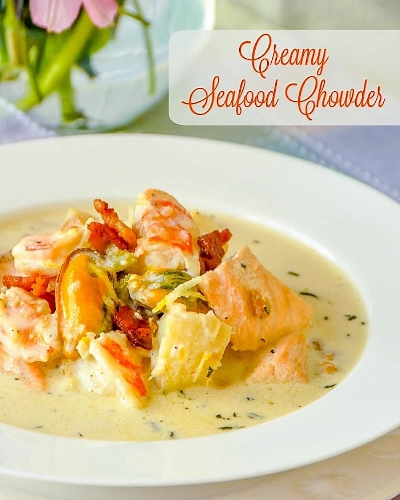 Creamy Seafood Chowder photo of a single serving in a white bowl with title text added for social media