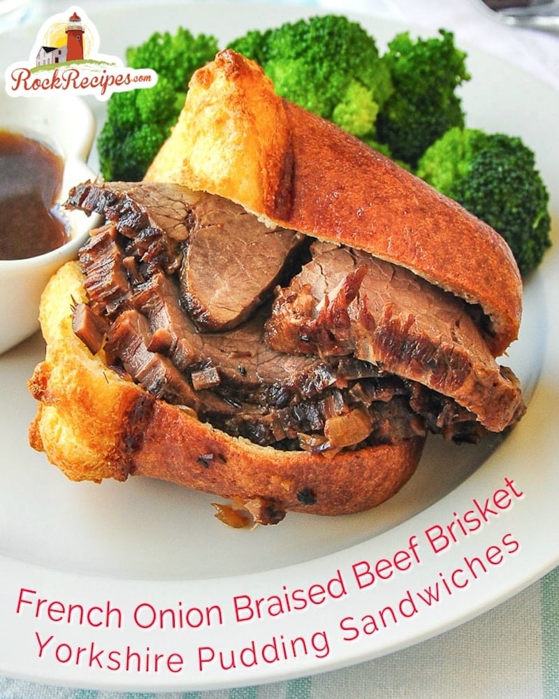 French Onion Braised Beef Brisket & Yorkshire Pudding Sandwich photo with title text for social media posts.