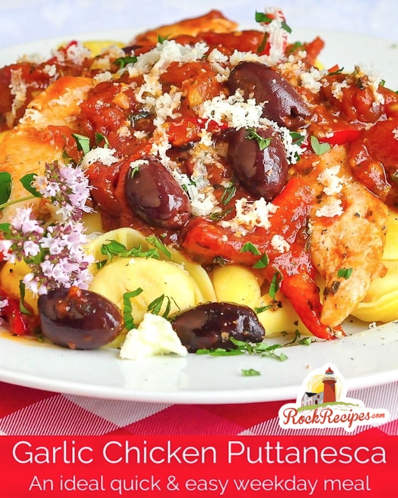 Garlic Chicken Puttanesca photo of one serving with title text added for social media posts.