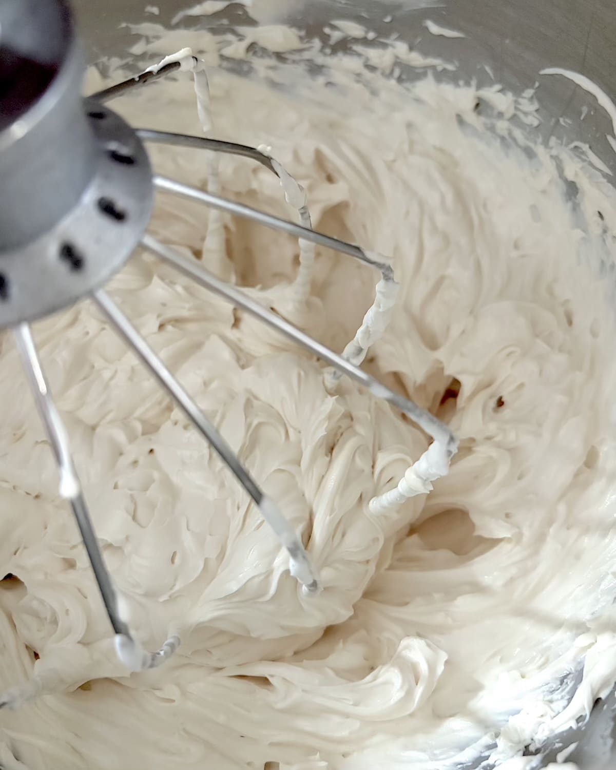 Whipped Cheesecake Frosting finished in a mixer bowl.