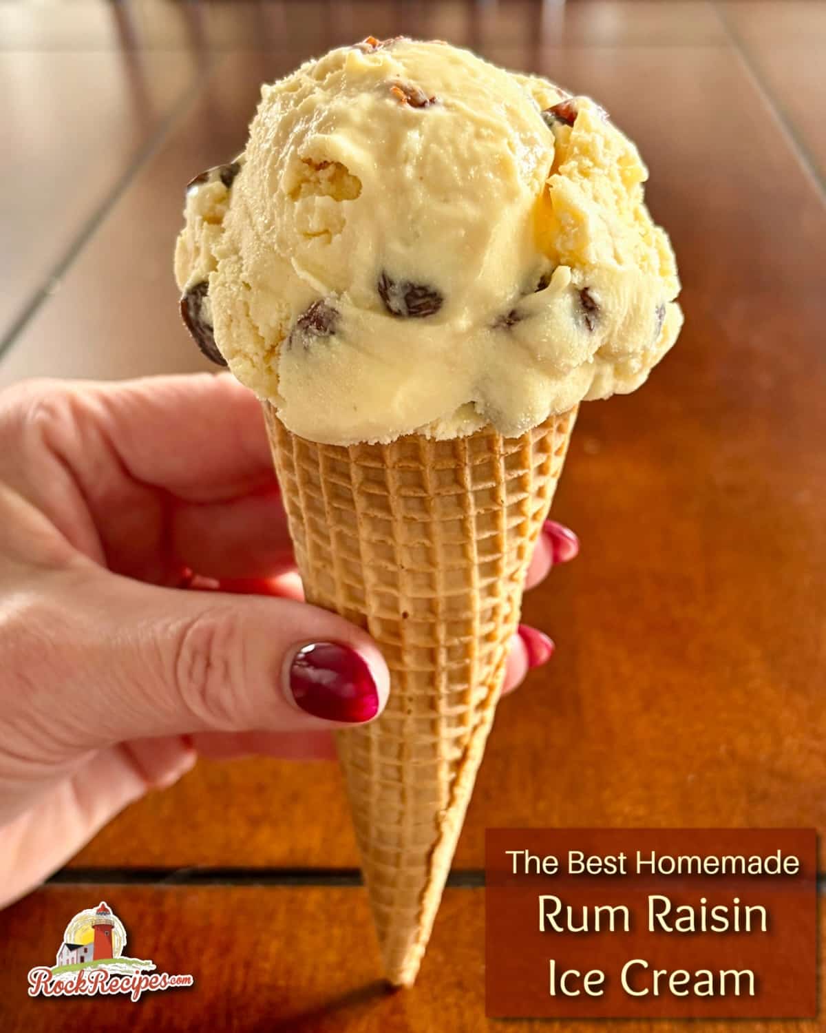 The best rum raisin ice cream photo of a ice cream cone with title text added for social media posts