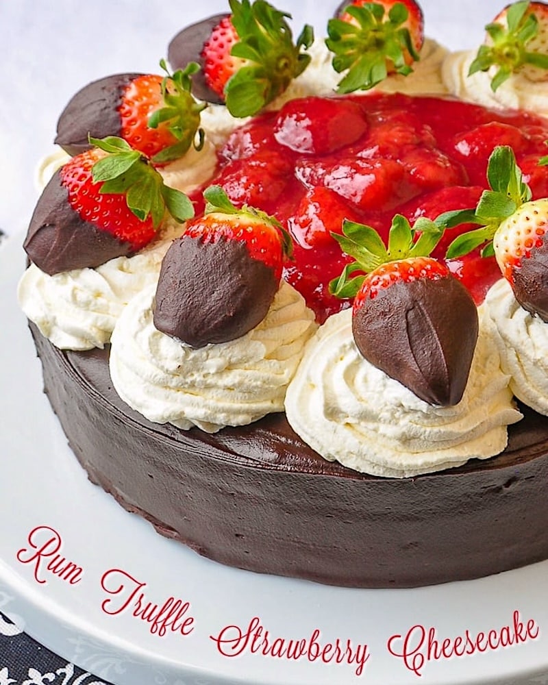 Rum Truffle Strawberry Cheesecake photo with title text for social media.