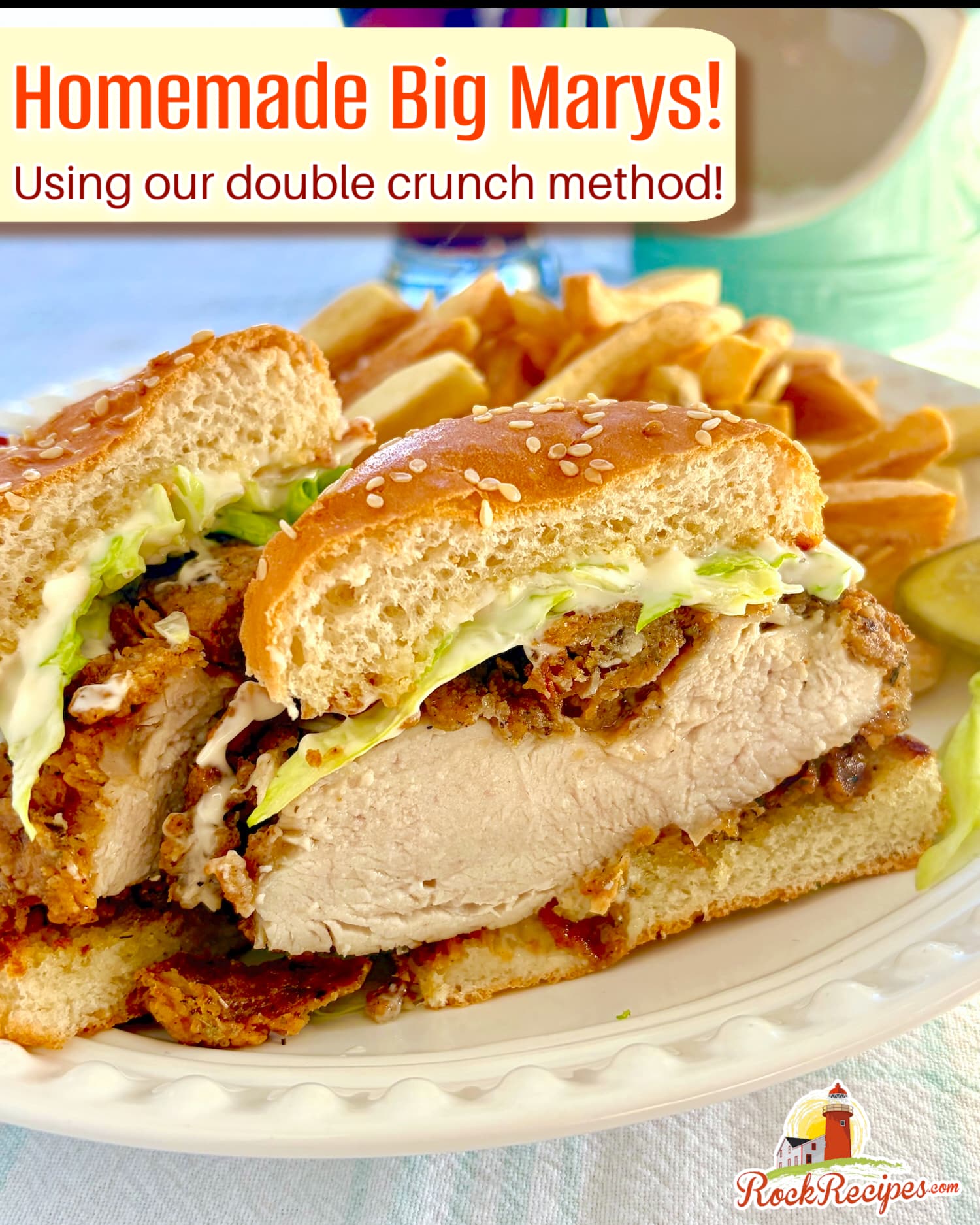 Big Mary Chicken Sandwich cut in half to show the cooked chicken breast pictured with french fries and with title text added for social media posts