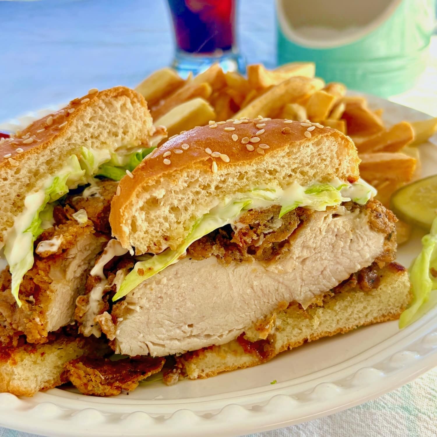 Big Mary Chicken Sandwich cut in half to show the cooked chicken breast.