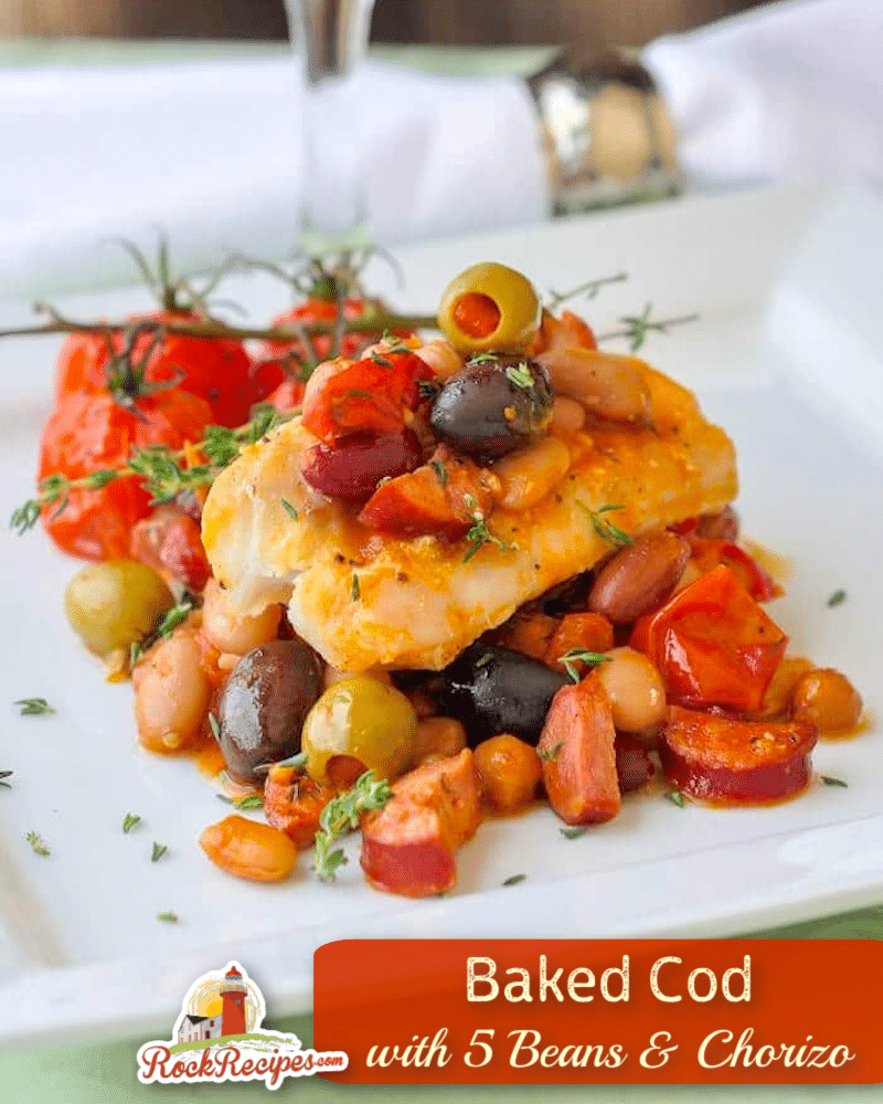 Baked Cod with 5 Beans & Chorizo close up ohoto of one serving with title text added for social media.