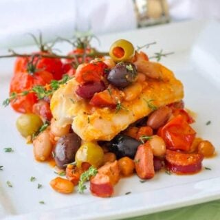 Baked Cod with 5 Beans & Chorizo close up ohoto of one serving.
