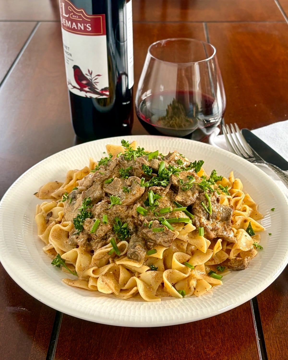 Beef Stroganoff photo of one serving on a white plate