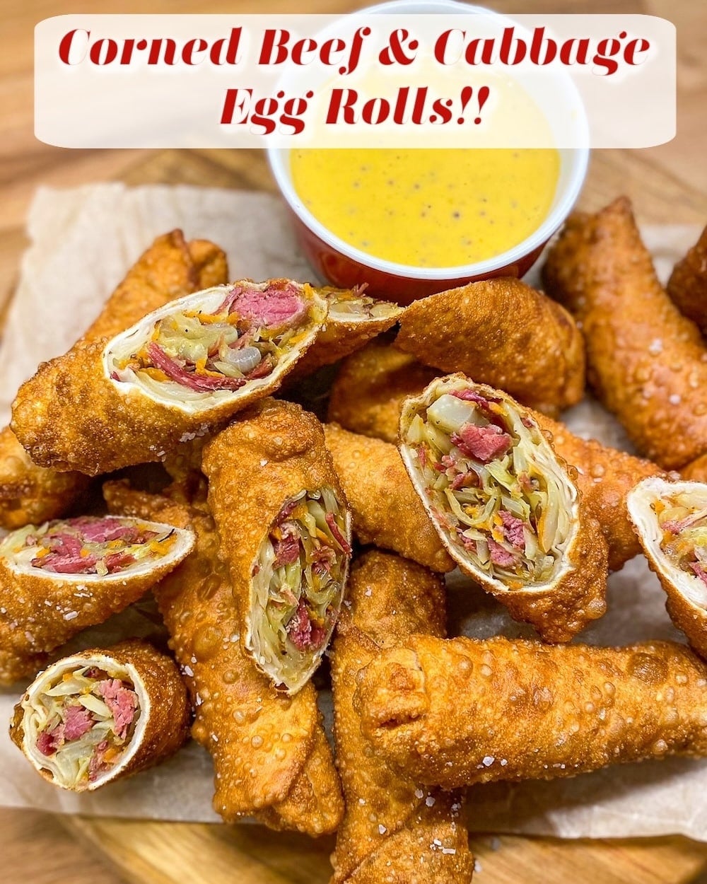 Overhead photo of Corned Beef & Cabbage Egg Rolls photo with title text added for social media posts