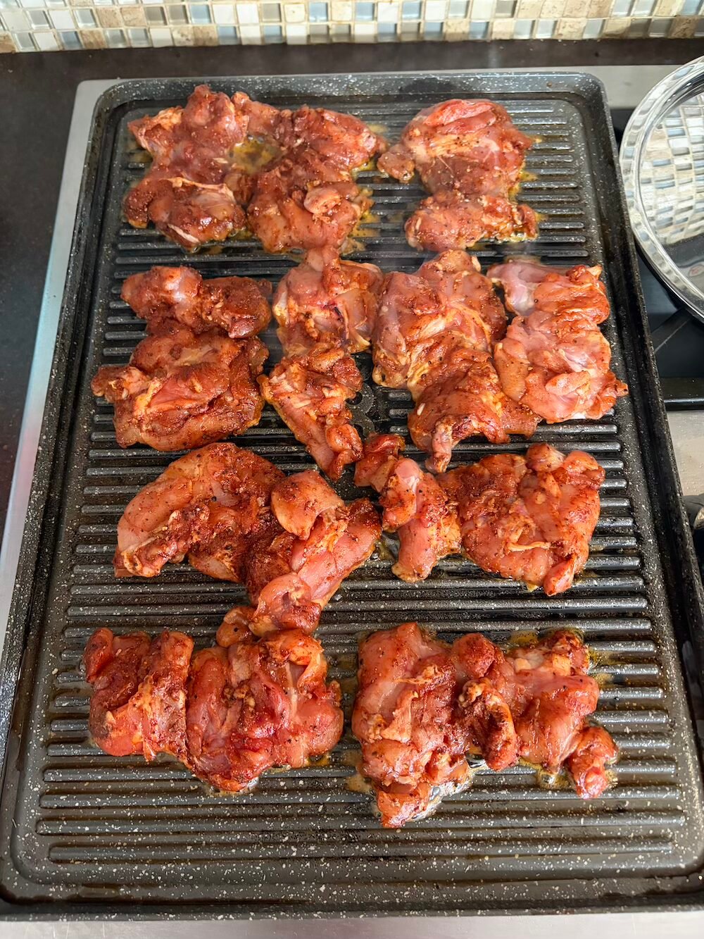 Photo of the chicken being grilled.
