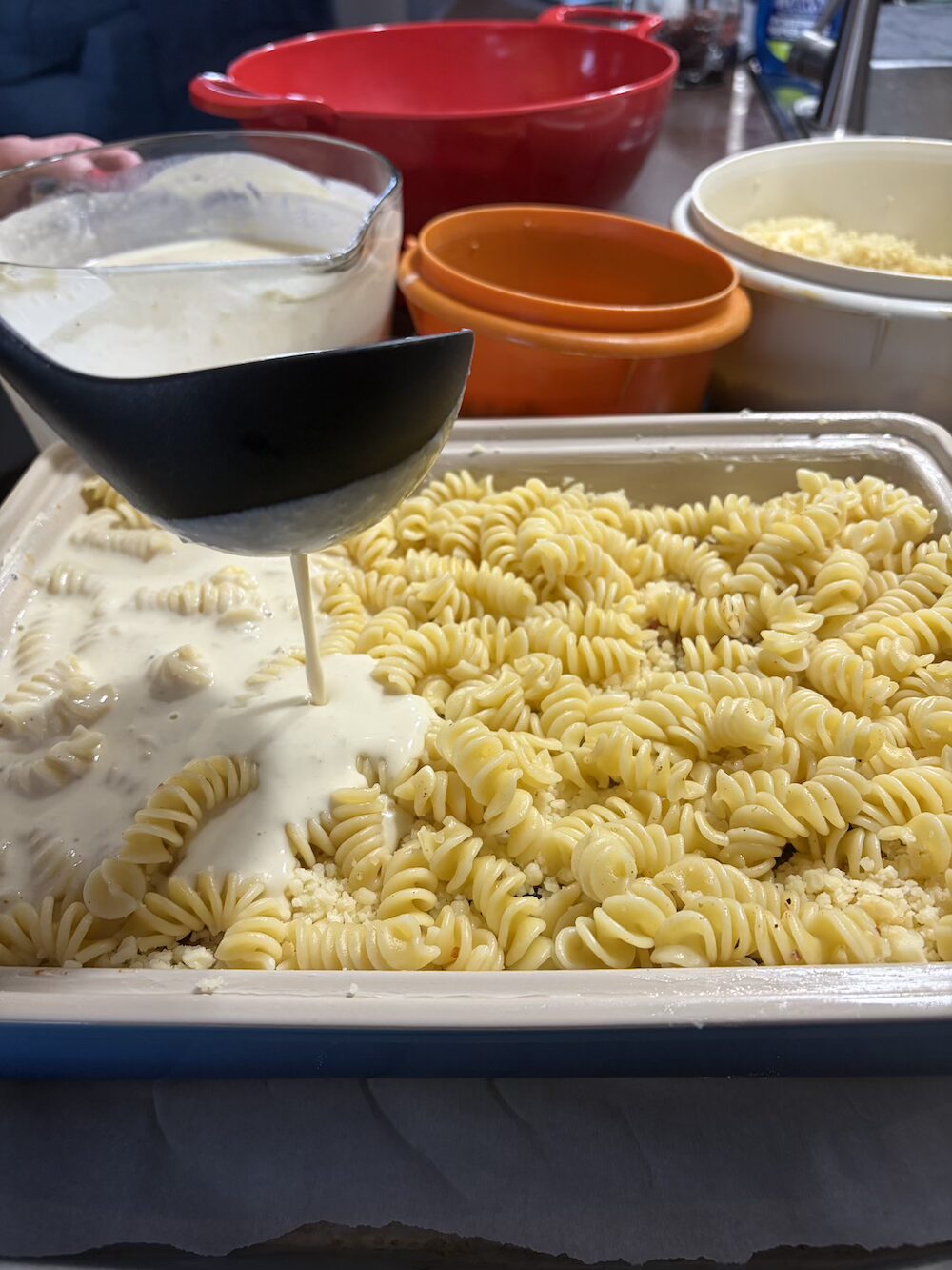 Addingsauce to the dish.