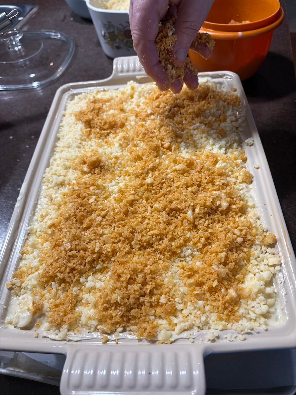 Adding the crumb topping.