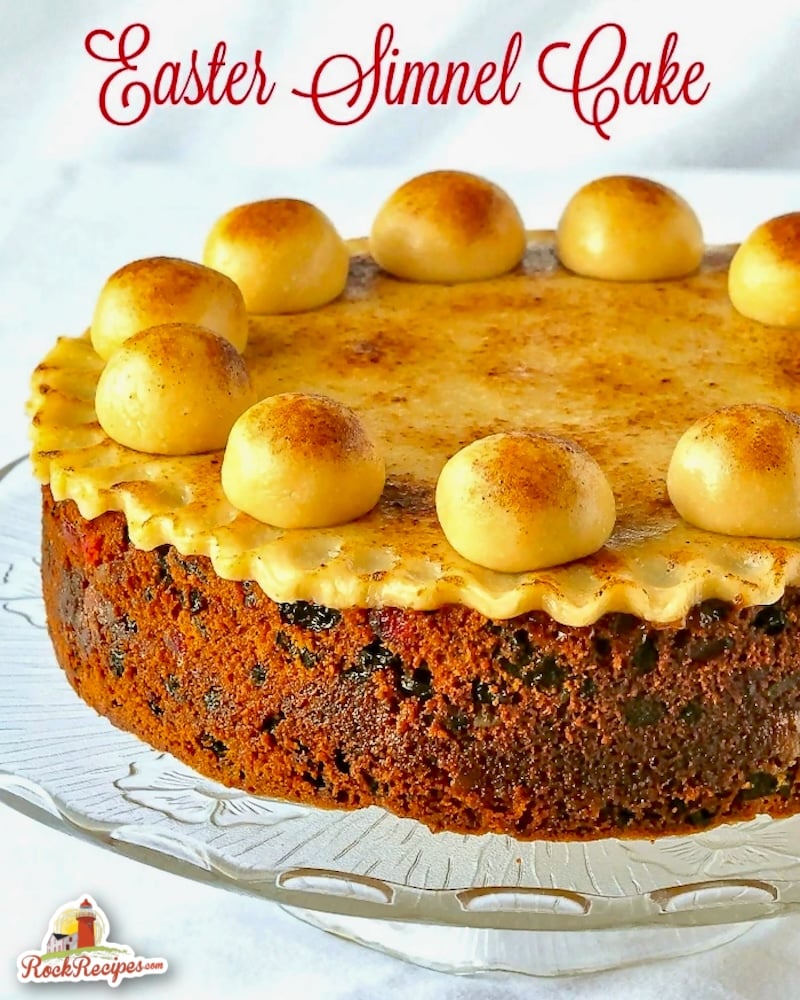 Simnel Cake photo on a clear glass stand with title text added for social media posts