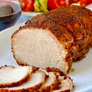 Brined Roast Pork Loin close up photo of sliced pork