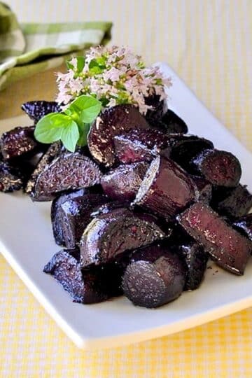 Balsamic and Honey Roasted Beets on a white serving platter.