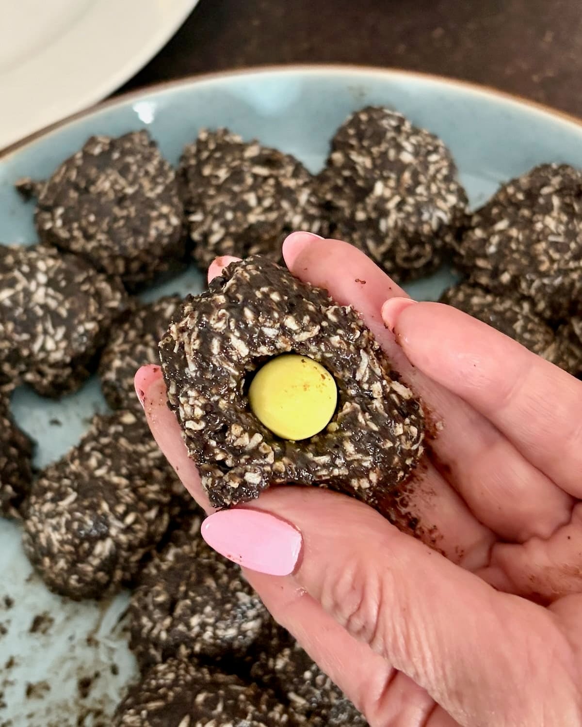 Photo adding a mini egg into the dent.