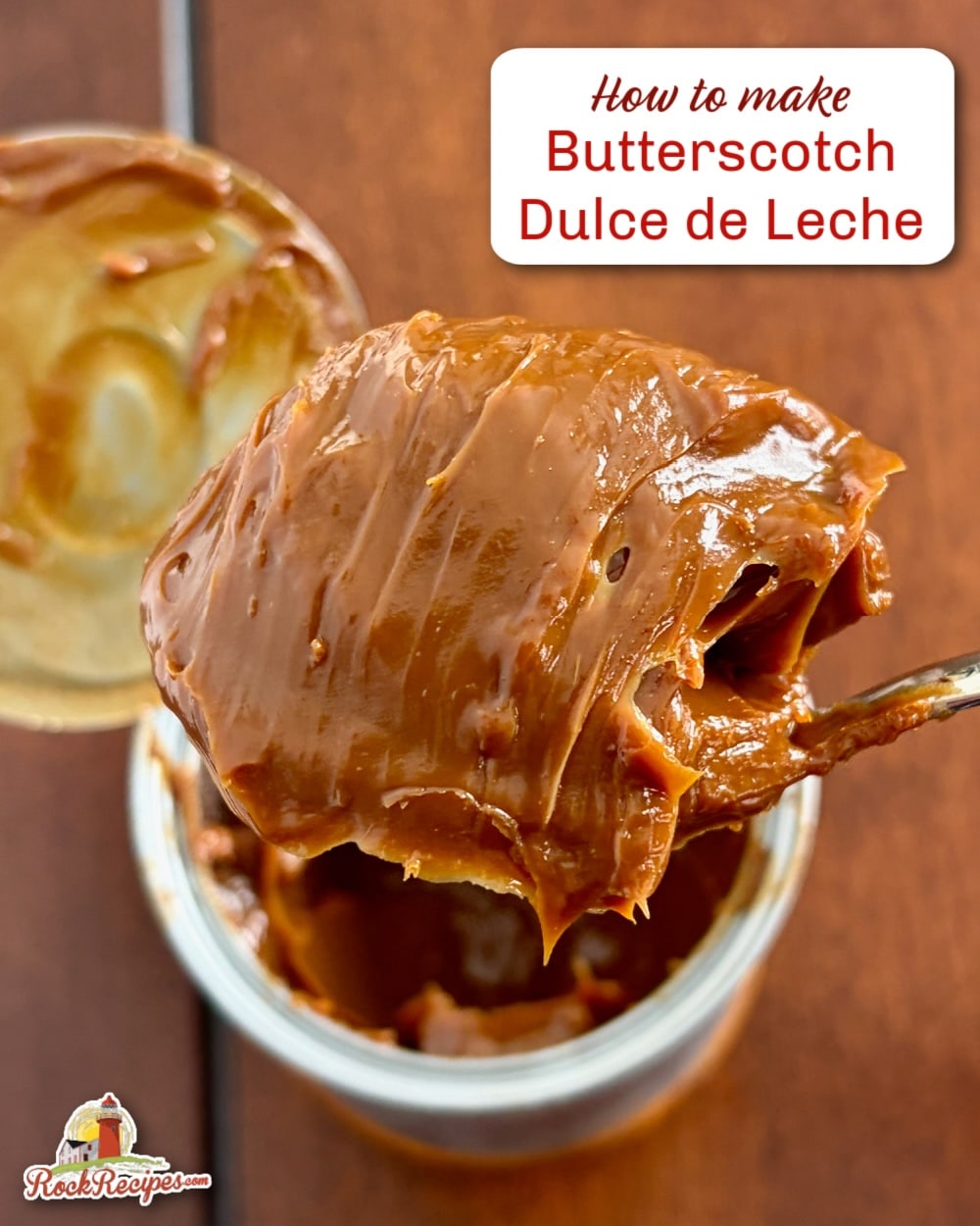 Leche scooped up on a tablespoon.