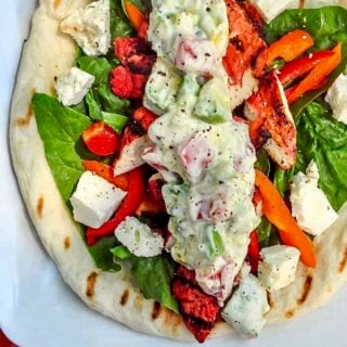 Chicken Souvlaki Wraps with Tomato Avocado Tzatziki overhead photo if one wrap.