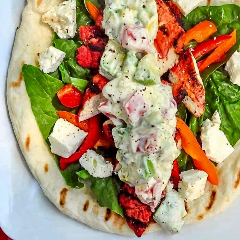 Chicken Souvlaki Wraps with Tomato Avocado Tzatziki overhead photo if one wrap.