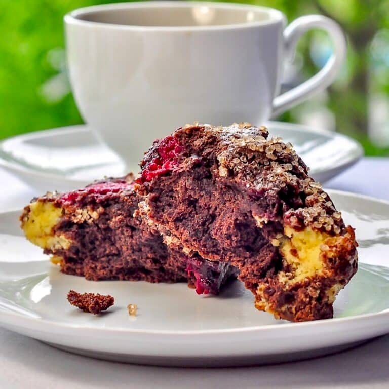 Chocolate Raspberry Cheesecake Scones broken in half to show inside