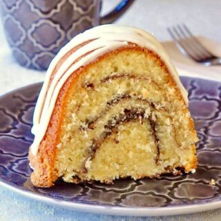 Close up photo of one slice of Cinnamon Roll Cake for Google freatured image.