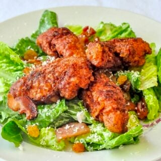 Fried Chicken Caesar Salad close up photo of one serving