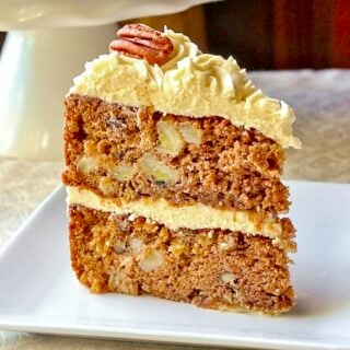 Hummingbird Cake close up photo of single slice on white plate
