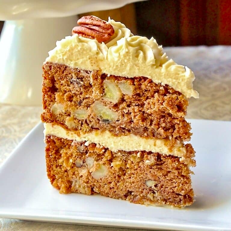 Hummingbird Cake close up photo of single slice on white plate