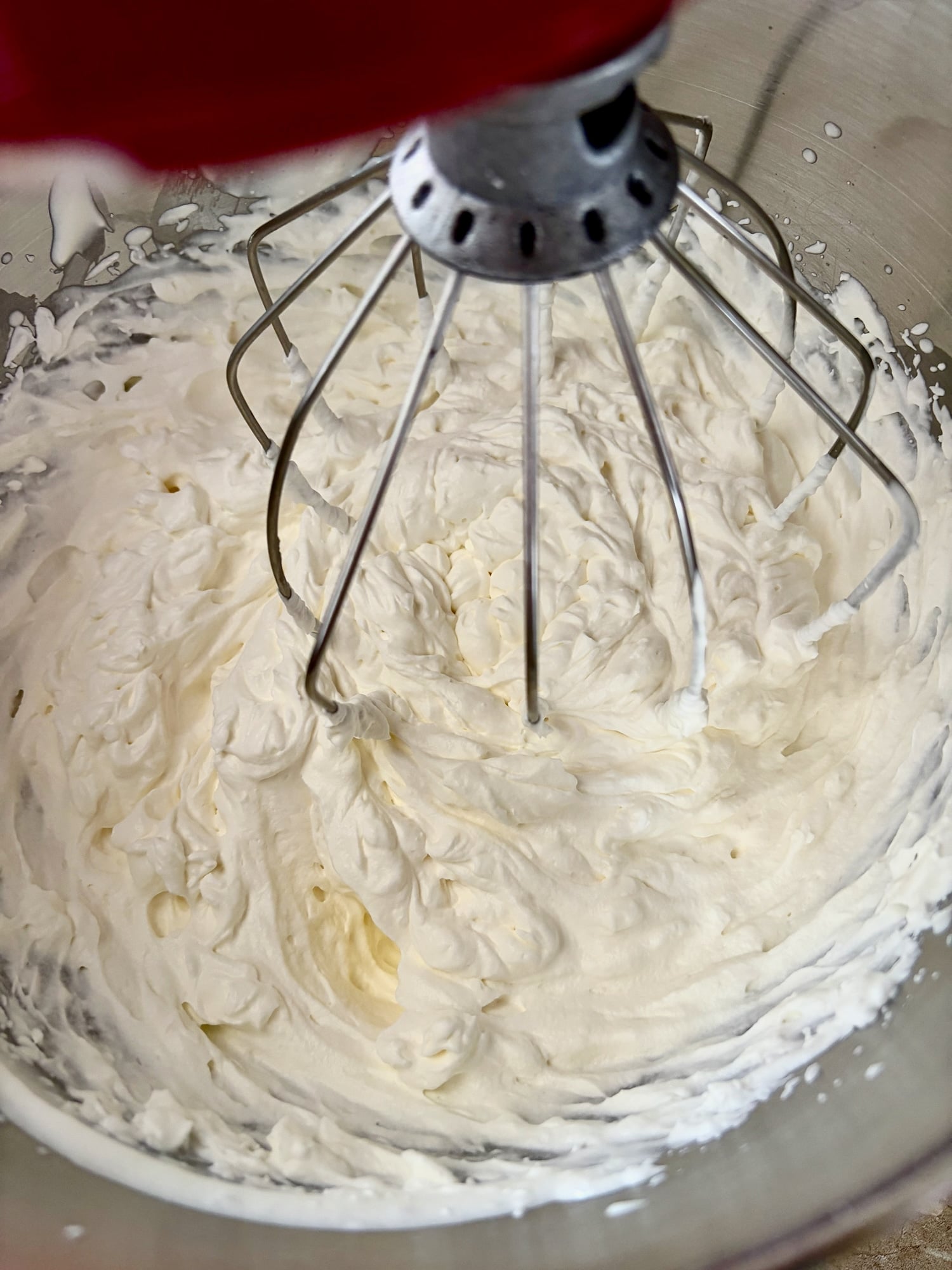 photo of Whipping the cream, icing sugar and vanilla