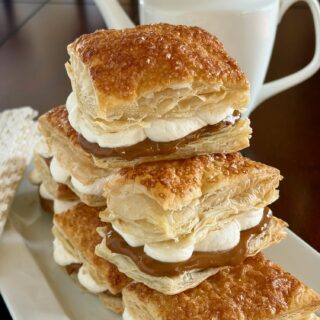 Close up image of Dulce de Leche Flakies stacked on a white platter