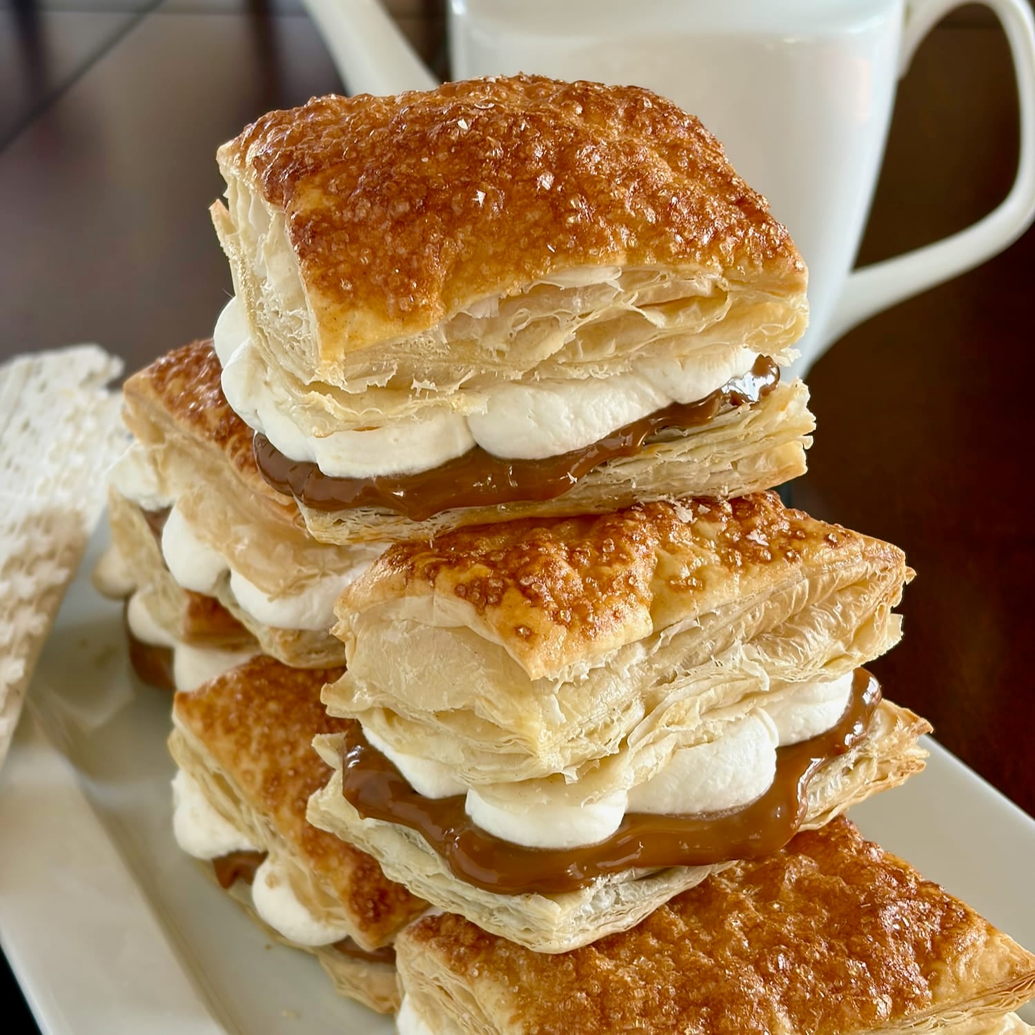 Close up image of Dulce de Leche Flakies stacked on a white platter 